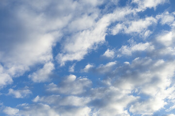 white clouds in the blue sky environment