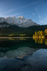 Fototapeta premium Lake eibsee at dawn with still water reflection