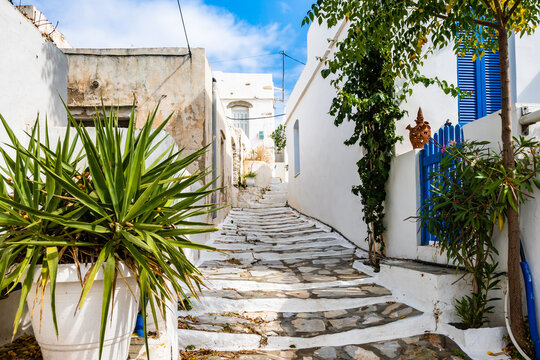 View of narrow street with white houses in Apollonia village, Sifnos island, Greece
