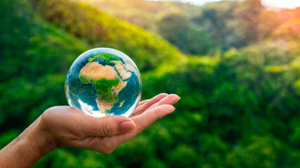 crystal earth in hands. Save Africa. save of earth. environment concept for background web or world guardian organization.	

