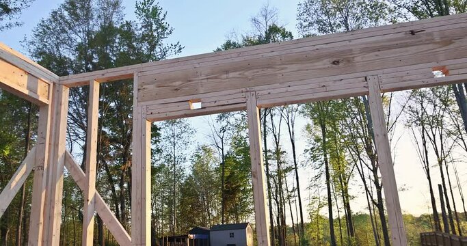 New house wooden framing supports beams studs timber framing with unfinished interior