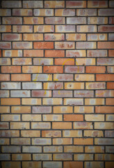 A yellow brick wall. The brick wall painted in yellow. 2