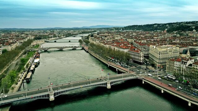 Aerial view of road traffic on bridges and the embankment of the River Rhone in Lyon, France