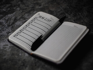 Notepad with a list of cases