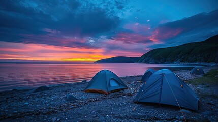 Blue Tents on seashore at sunset, Cape Breton Island, Canada.

 - obrazy, fototapety, plakaty