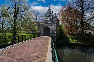 View of the renaissance architecture Oosterpoort gate from the golden age and adjoining bridge in...