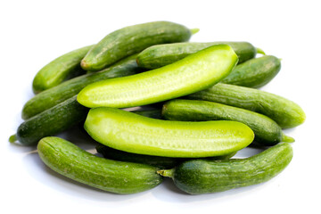 Mini cucumbers on white background.