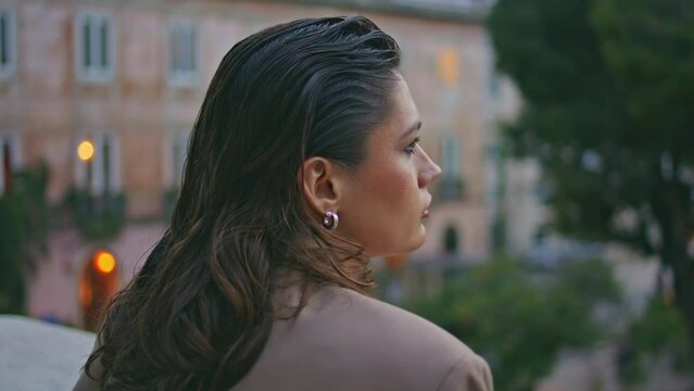 Calm girl waiting meeting at evening street close up. Stylish businesswoman