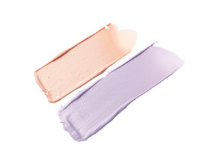Strokes of pink and purple color correcting concealers on white background
