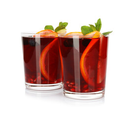 Aromatic Sangria drink in glasses isolated on white