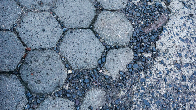 hexagonal paving stones and pebbles for an abstract background