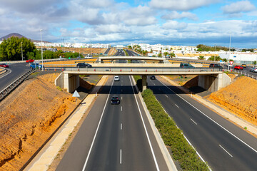Aerial view of highway in Gran Canaria, Canary Islands, Spain. Bridge over the asphalt road in...