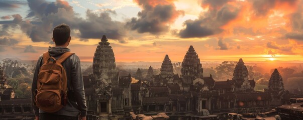 At sunrise, a lone backpacker marvels at Angkor Wat, immersed in the tranquil, golden light.