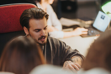 Focused creative professional explaining ideas at a business meeting.