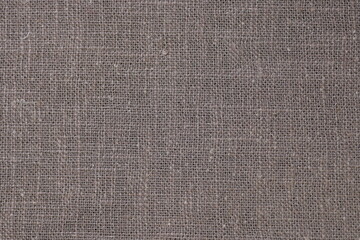 Fototapeta na wymiar drak brown hemp viscose natural fabric cloth color, sackcloth rough texture of textile fashion abstract background