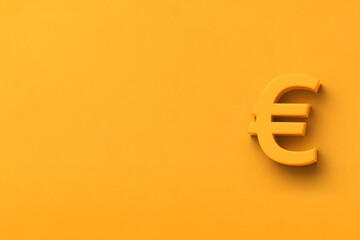 Yellow background with text space and a 3D euro symbol - obrazy, fototapety, plakaty