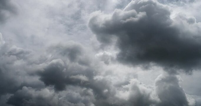 Dramatic dark storm rain clouds black sky background. Dark thunderstorm clouds rainny atmosphere. Meteorology danger windstorm disasters climate. Dark cloudscape storm disaster gloomy gray cloud sky