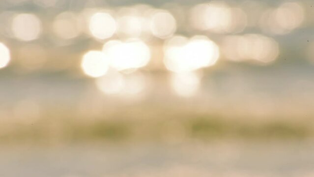 Blurred background golden glitter shiny sparkling banner. Glitter digital light blur bokeh glow soft backdrop effect. Gold bokeh template for digital presentation slideshow background desgn element