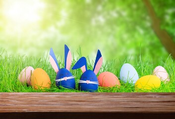 painted colored easter eggs at nature background