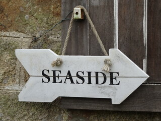 hanging wooden sign for seaside