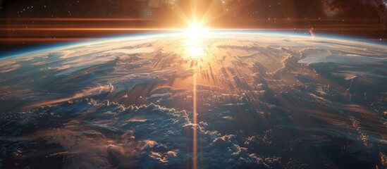 A breathtaking view of the planet Earth from outer space as the sun rises over the horizon, casting a warm glow on the surface