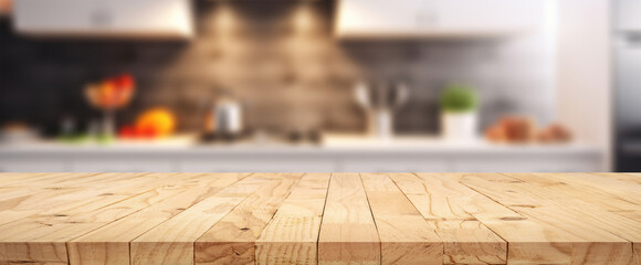 Wood table top on blur kitchen counter with window (room)background.For montage product display or...