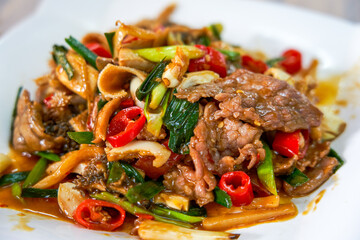 A plate of delicious and tempting stir-fried beef offal
