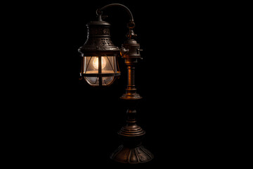 beautiful old vintage glowing lamp on black background