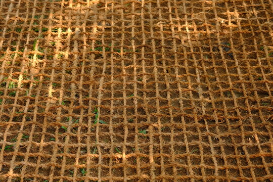 jaring sabut kelapa, coconut coir net. made of woven coconut coir rope. This net is useful for mine reclamation and reclamation of the environment damaged by humans. geo textile. 