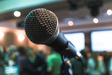 Close-up of a microphone at a financial technology conference spotlighting discussions on how fintech innovations are reshaping the economic landscape
