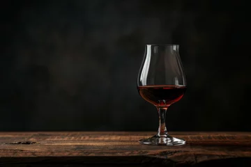 Fotobehang Port wine on dark wooden table vertical orientation Aperitif © The Big L