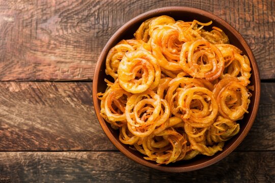 Top view of delicious Indian snack Fafda or Faafda made of gram flour fried and enjoyed during tea time festivals holidays Best paired with jaleb