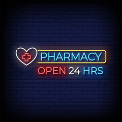 pharmacy open 24 hours neon Sign on brick wall background 