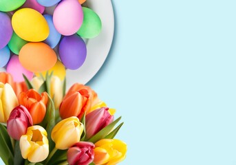 Easter Composition: colorful eggs, fresh flowers