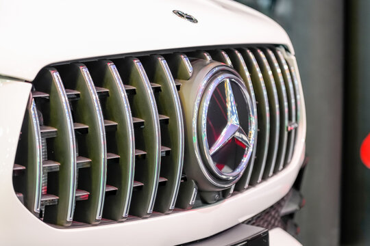 Logo radiator screen Mercedes Benz amg cls 53 white turbo 4matic. Thailand, Bangkok 07 april 2024