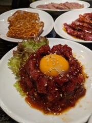 Beef sashimi with raw egg