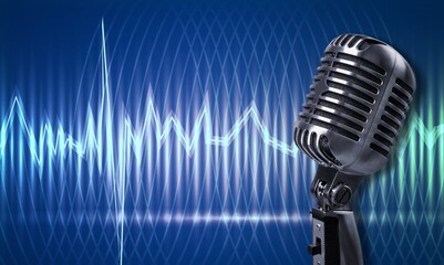 Podcast microphone with blue ligthing, wave signal