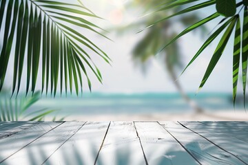 A wooden table on a tropical beach with palm trees and blue water.