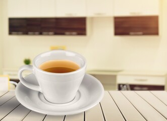 Cup of tasty aroma hot Tea on desk