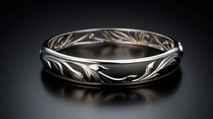 Poster Luxurious display of a polished silver bangle with elegant lily engravings, arranged on a glossy black surface for a striking contrast © kitidach