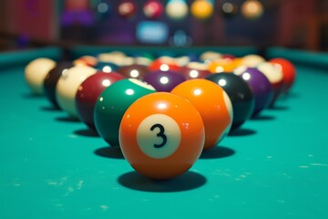 Numbered colored billiard balls arranged on a table near the pocket