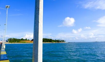 Tanjung Snake Pier Light Pole With Blue Sea Water