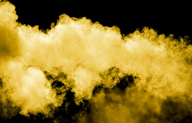 Yellow smoke isolated black background