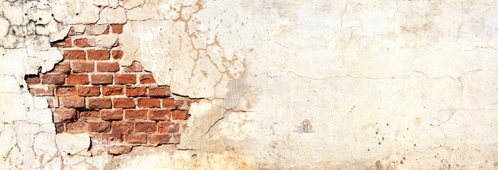 Grunge background with texture of old brick wall and cracked stucco of white color. Horizontal...