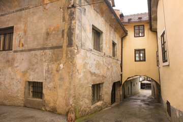 Fototapeta na wymiar An arch spanning a medieval street in the historic centre of Skofja Loka in Gorenjska, Slovenia