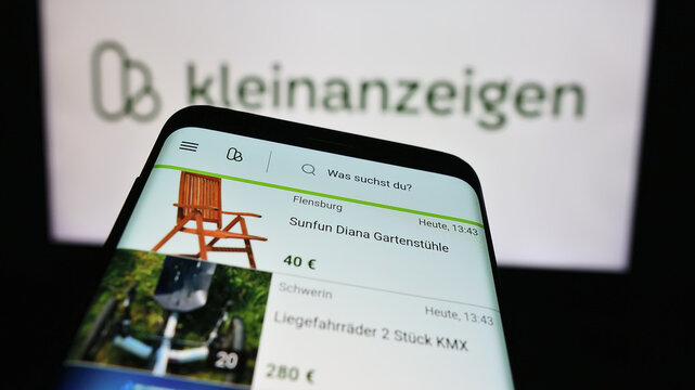 Stuttgart, Germany - 04-13-2024: Mobile phone with website of German classifieds platform company kleinanzeigen.de GmbH in front of logo. Focus on top-left of phone display.