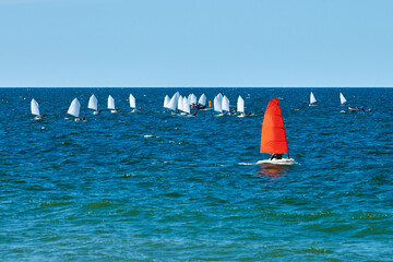 Blue sea sailing regatta, nautical spectacle sport sailing competition among yacht club participants symbolizing spirit of maritime sailing challenge, yacht racing hobby