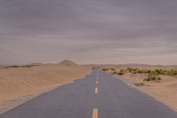 An empty highway going through the desert, Inner Mongolia, China