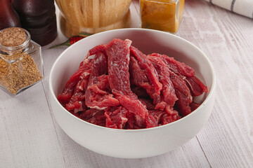 Raw beef meat - sliced strips