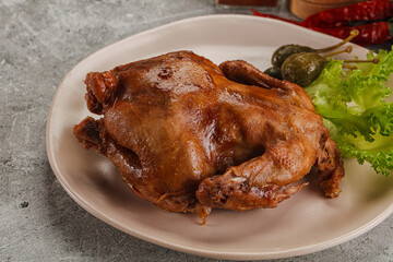 Baked small chicken with spices